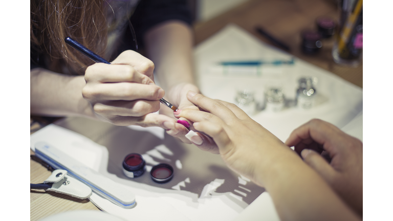 Manicure treatment at nail shop