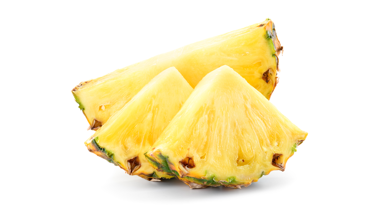 Pineapple slice isolated. Pineapple composition. Perfect retouched photo.