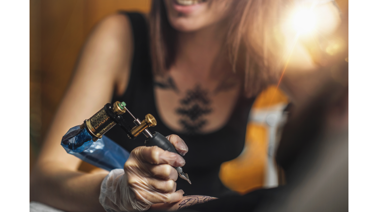 Female Tattoo Artist