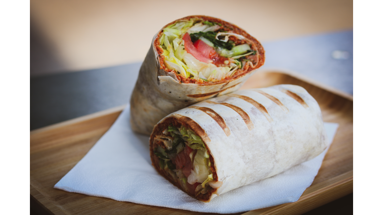 Close-Up Of Burrito In Plate On Table