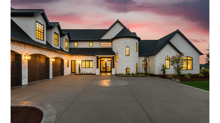 Stunning luxury home exterior at sunset