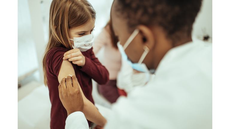 Little girl getting vaccinated