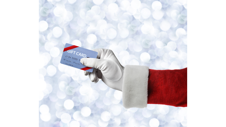 Santa Holding A Gift Card