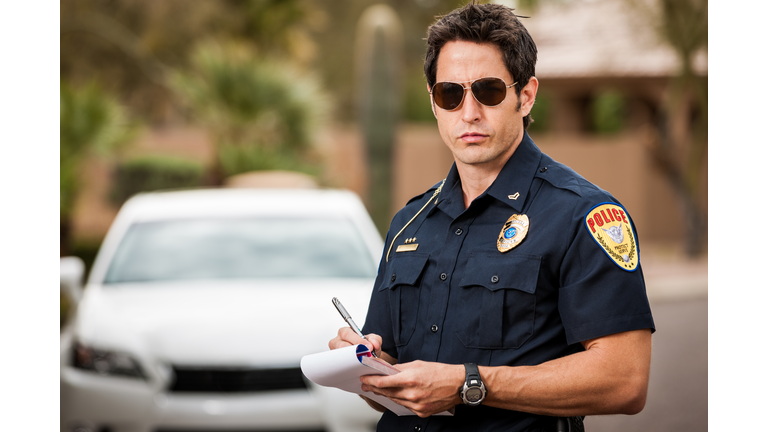 Police Officer Writing Traffic Citation