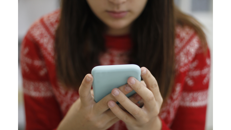 Young Woman Using Smart Phone