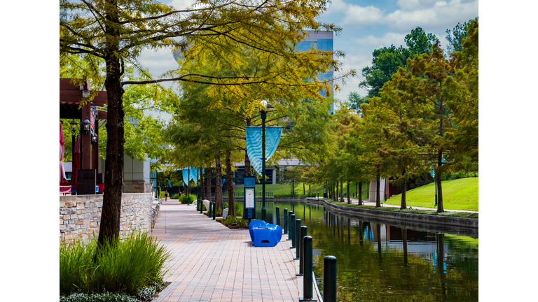 Sidewalk along waterway in the Woodlands, TX