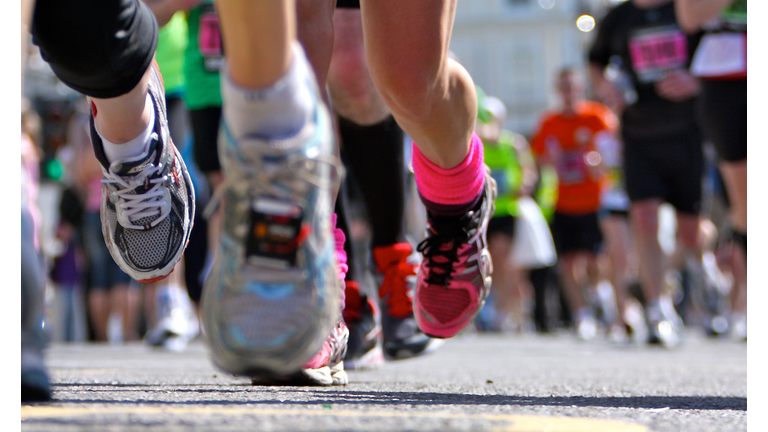 Marathon Runners close up legs and shoes