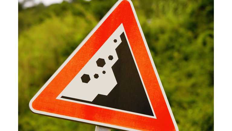 Close-up of a landslide road sign, Via Aurelia, Italian Riviera, Liguria, Italy