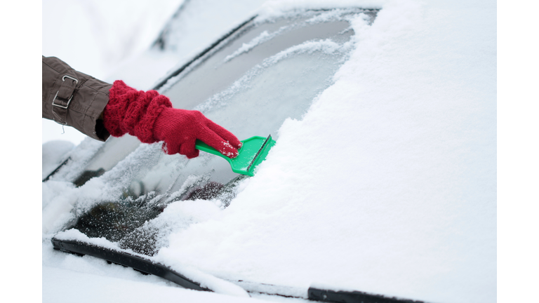 Removing Ice and Snow from the Car windshield