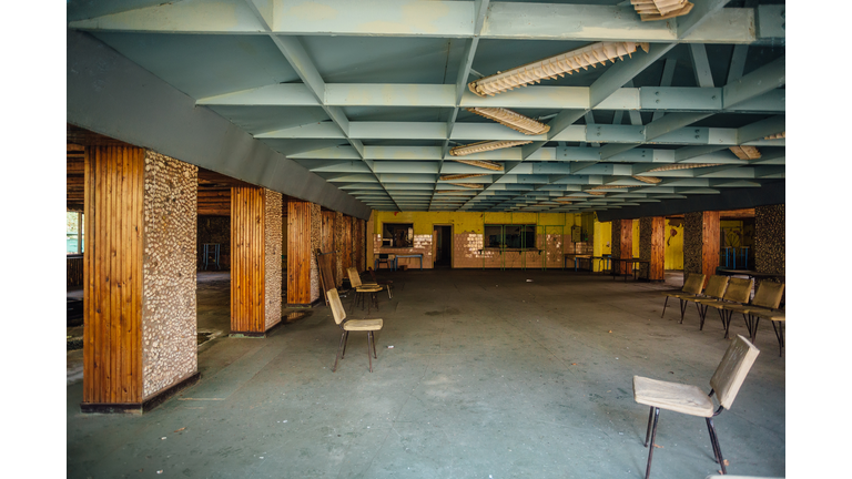 Abandoned children's canteen. Derelict dining room in pioneer camp