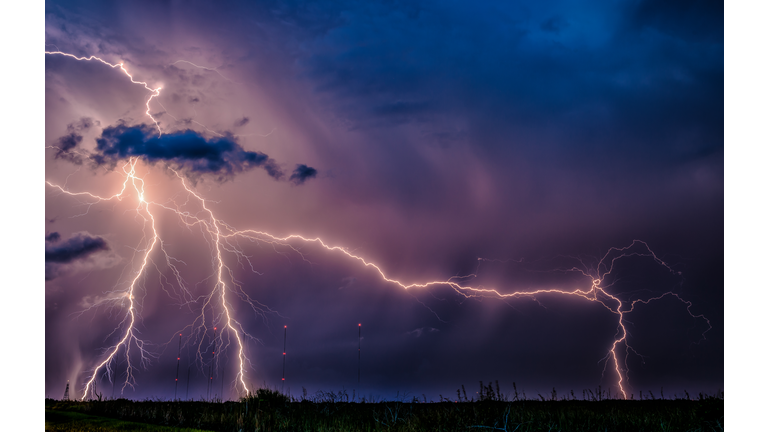 Panoramic view of lightning against sky at night