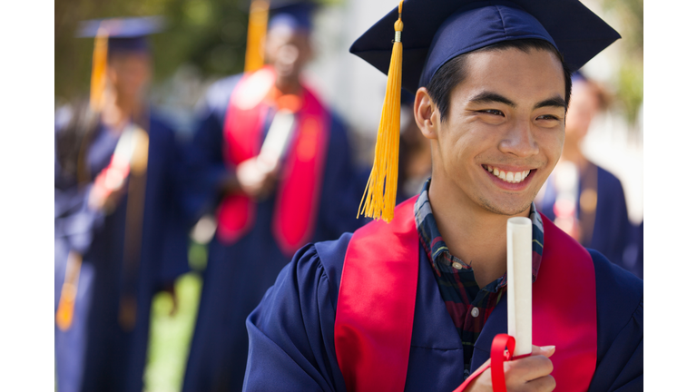 Graduate in cap and gown