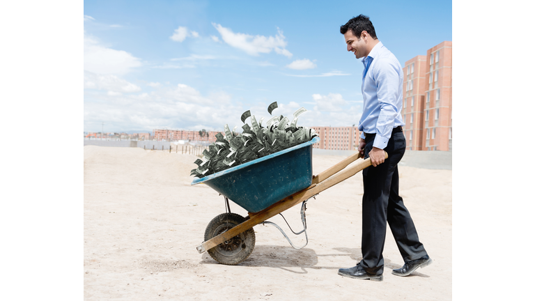 Rich man carrying money