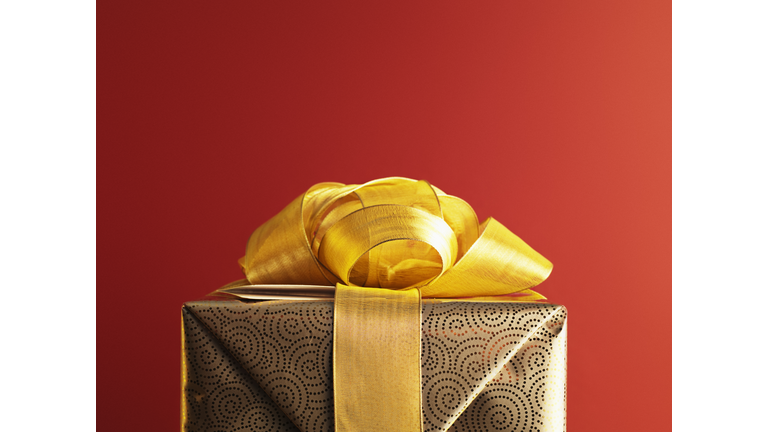 Christmas gift with gold ribbon