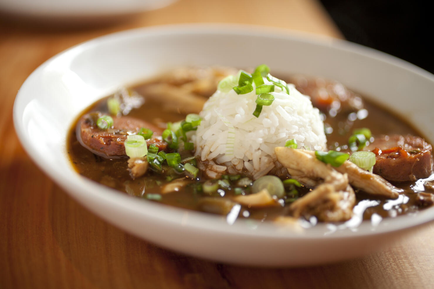 Dinner consisting of chicken gumbo with rice