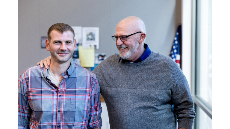 Mature dad is proud of military vet son