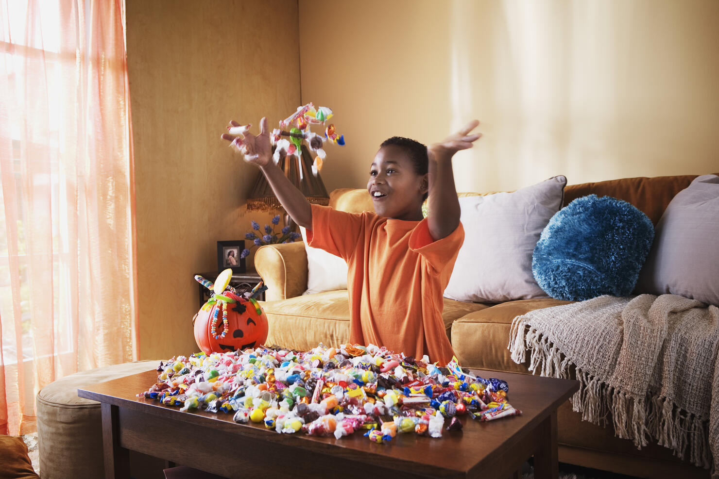 Excited boy with Halloween candy