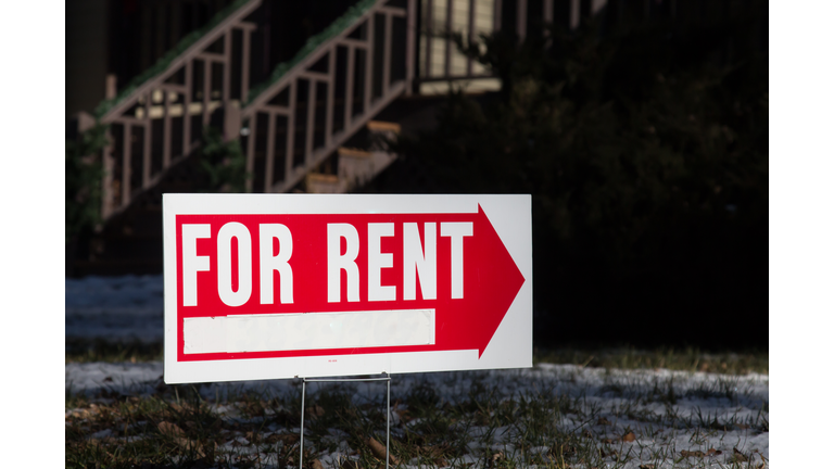 Home for rent sign with red arrow