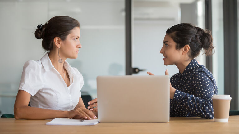 Diverse business woman team discussing work issues
