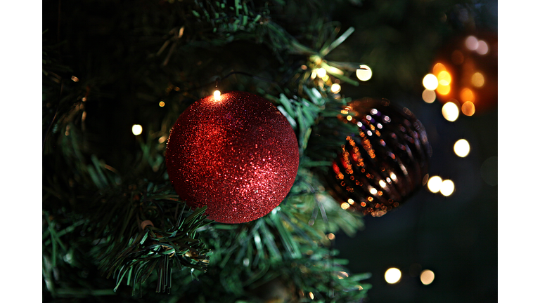 Close-Up Of Christmas Decorations Hanging On Tree