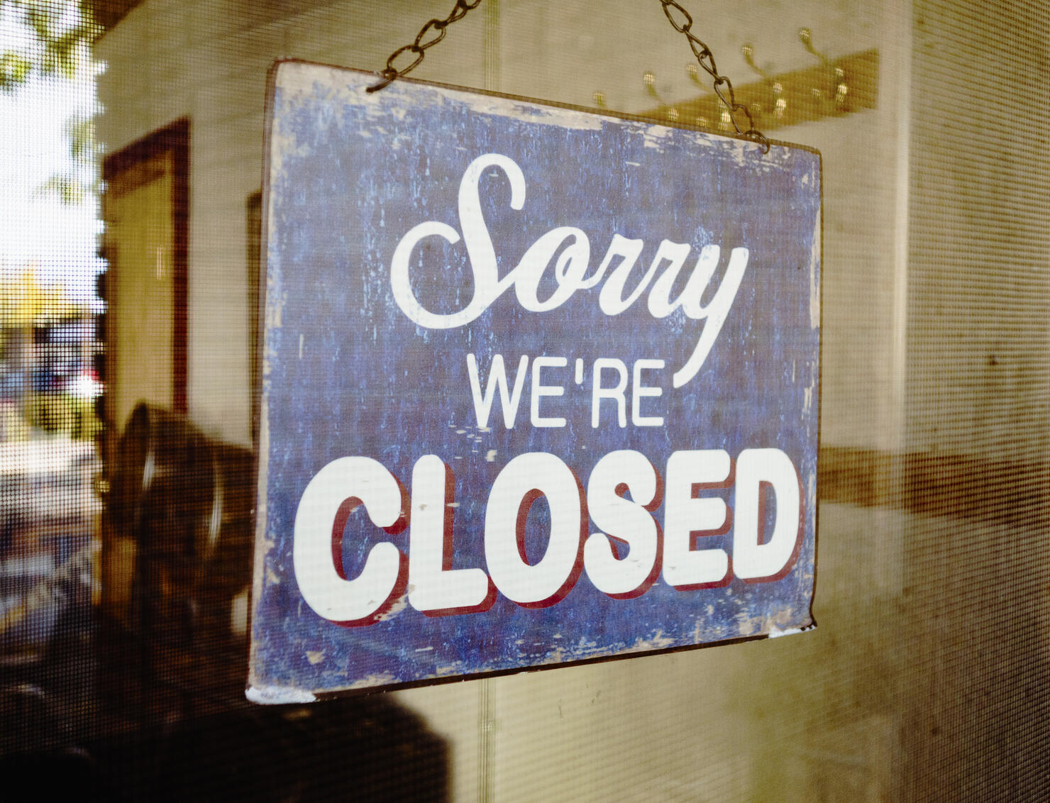 Closed sign on glass door