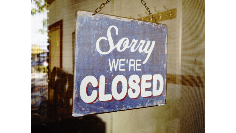 Closed sign on glass door