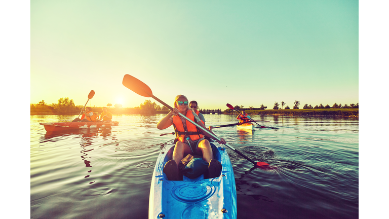 Wild nature and water fun on summer vacation. Camping and fishing.