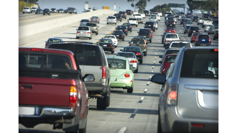 Lanes of cars on a busy highway