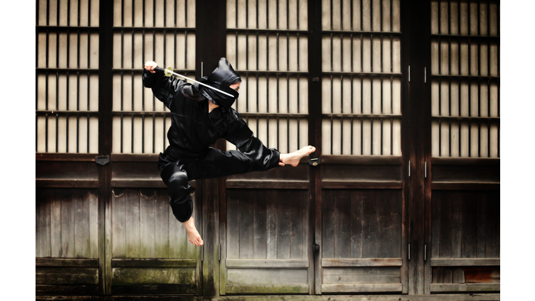 Asian woman showing her ninja moves