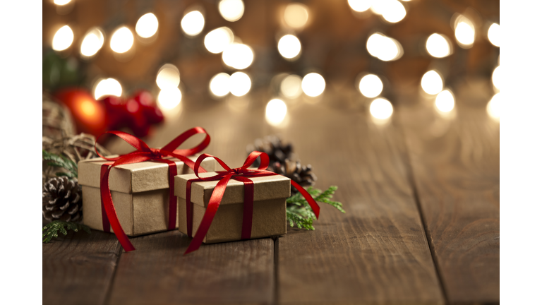 Christmas gift boxes on rustic wooden table