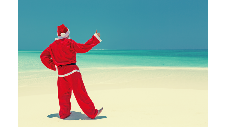 Santa Claus celebrate Christmas beach