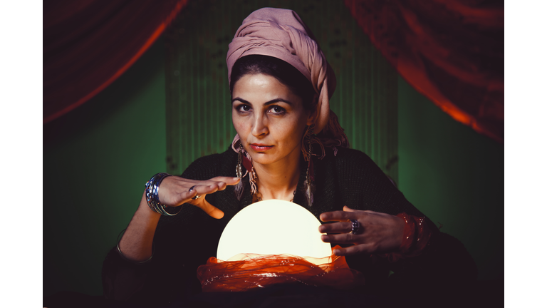 Female Fortune Teller With Crystal Ball