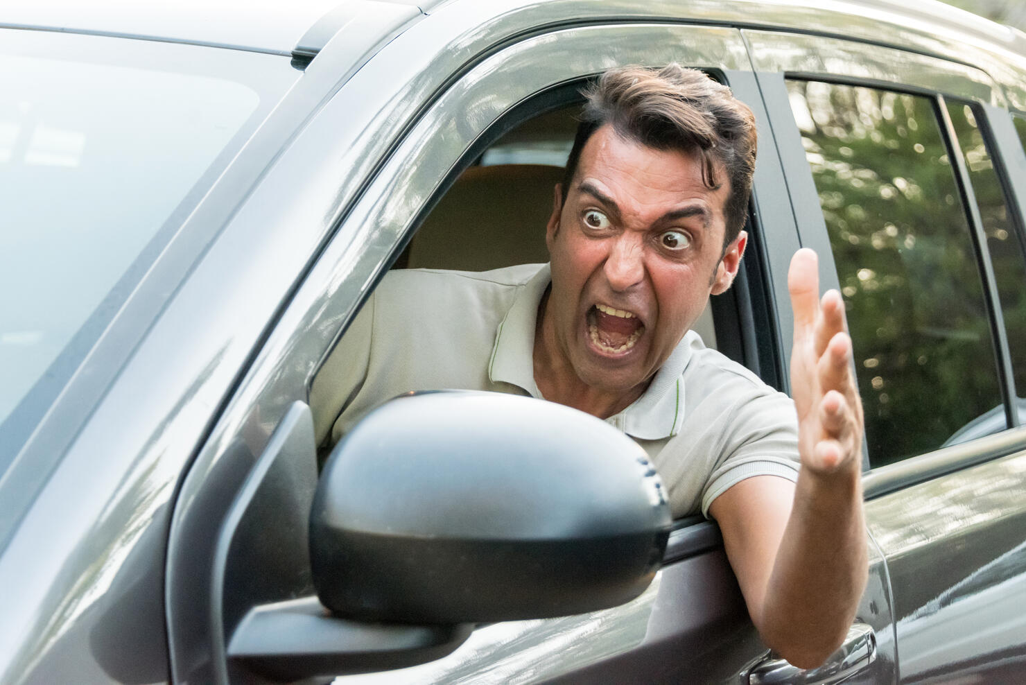 Stressed Mature man driving his car