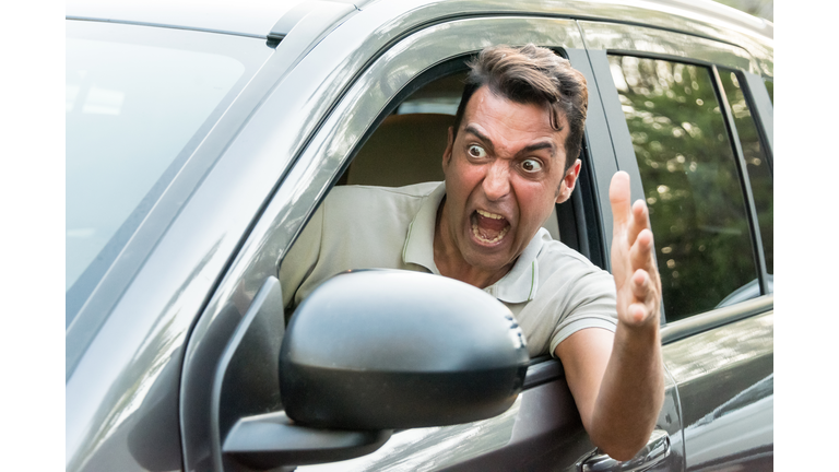 Stressed Mature man driving his car