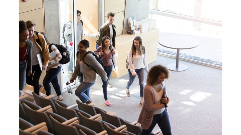 Group of students entering lecture hall