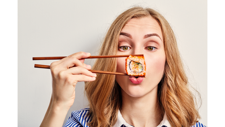 woman with sushi