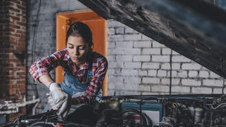 Dog found alive stuck inside of a car engine. But why? Find out here.