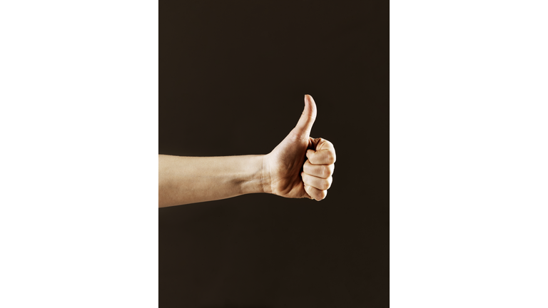 Hand indicating thumbs up