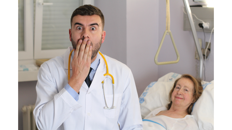 Embarrassed doctor making a mistake