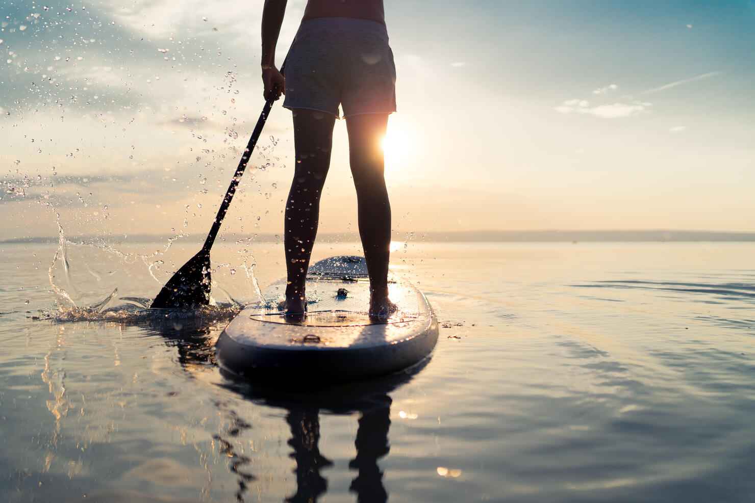 summer sunset lake paddleboarding detail