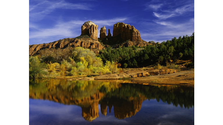 Oak Creek reflects Cathedral Peaks  in Red Rocks State Park