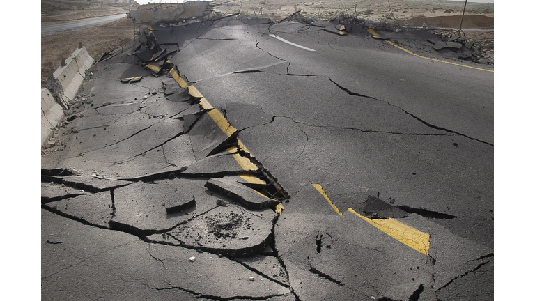 cracked asphalt after earthquake