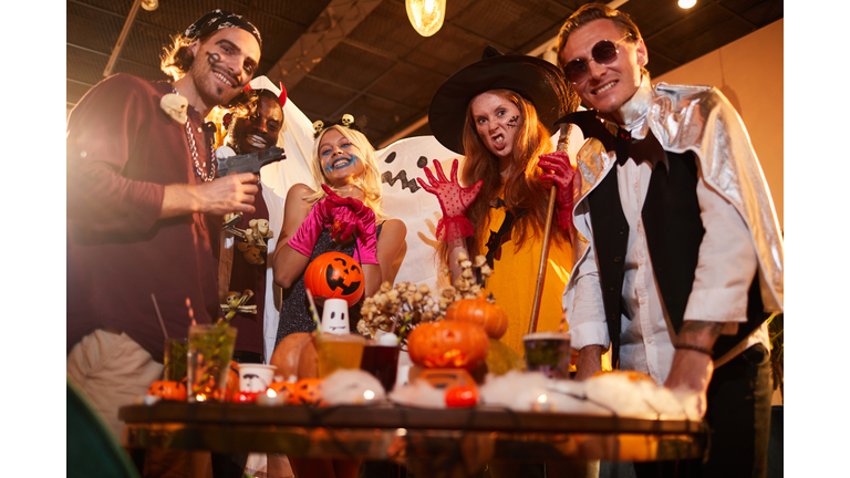 Young People Having Fun at Halloween Party