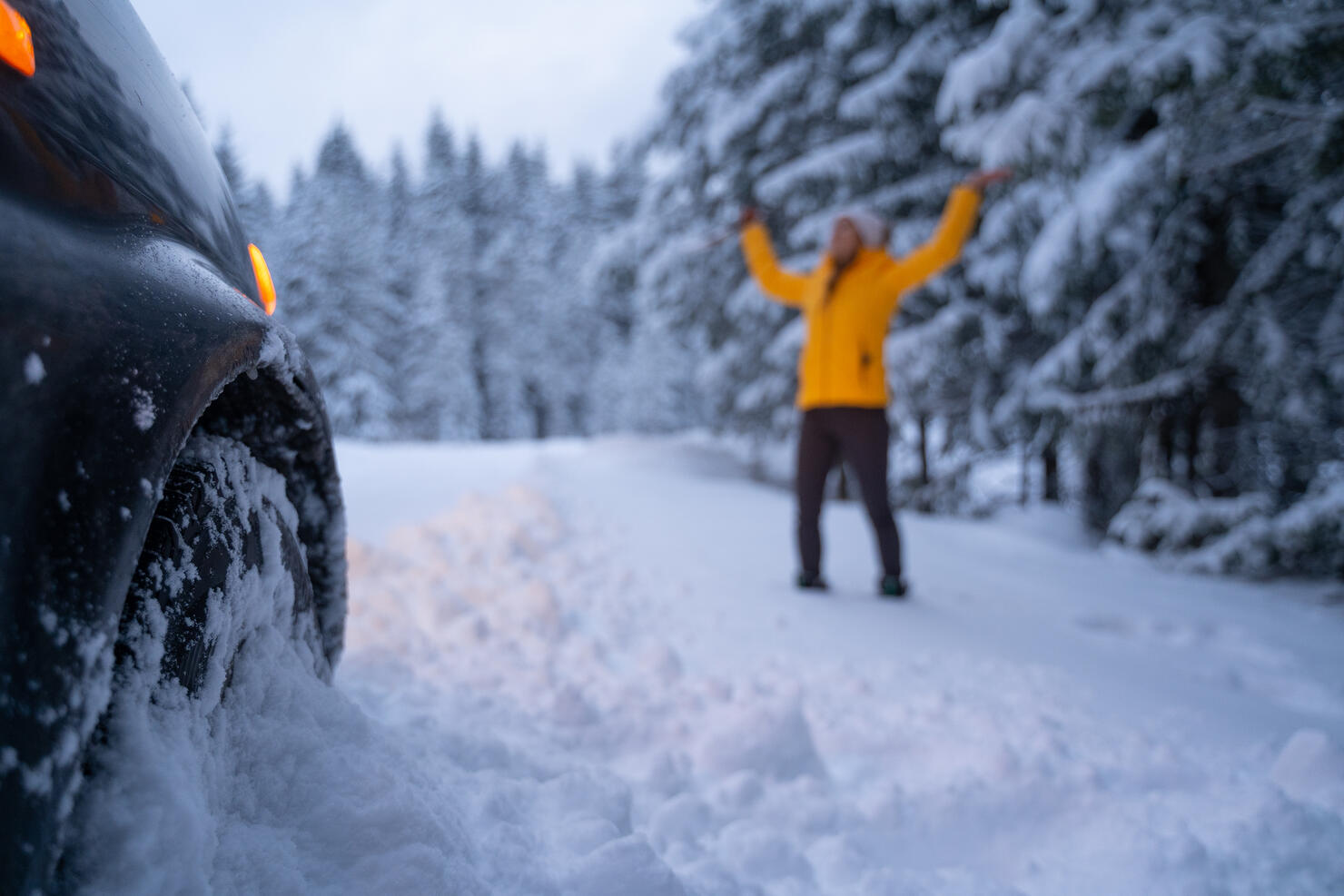 Cleaning the car and sweeping after the first snow. Emergency lights. Car issues in the middle of nowhere in bad weather. Car insurance. One woman on the road.