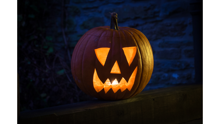 Close-Up View Of Illuminated Jack O Lantern At Night