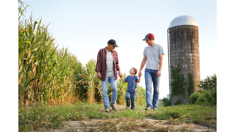 Three generations of men on farm