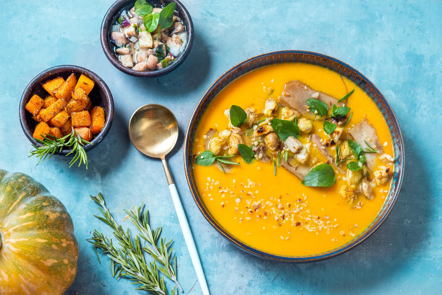 Creamy pumpkin soup with chestnuts and mushrooms