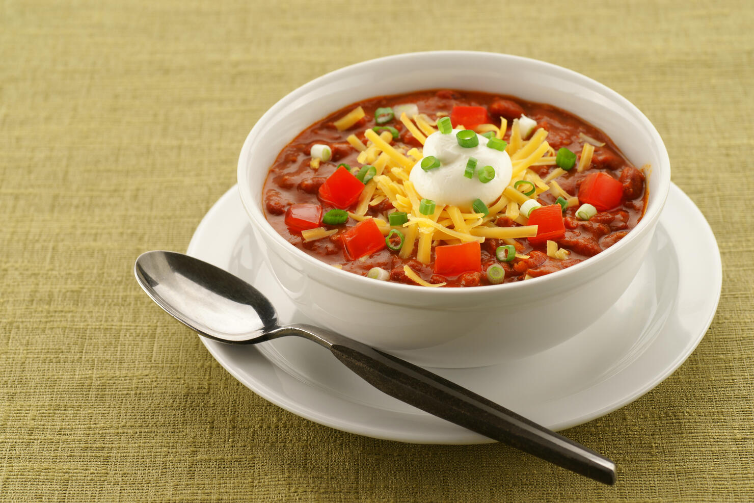 Bowl of Chili on Retro Green Tablecloth