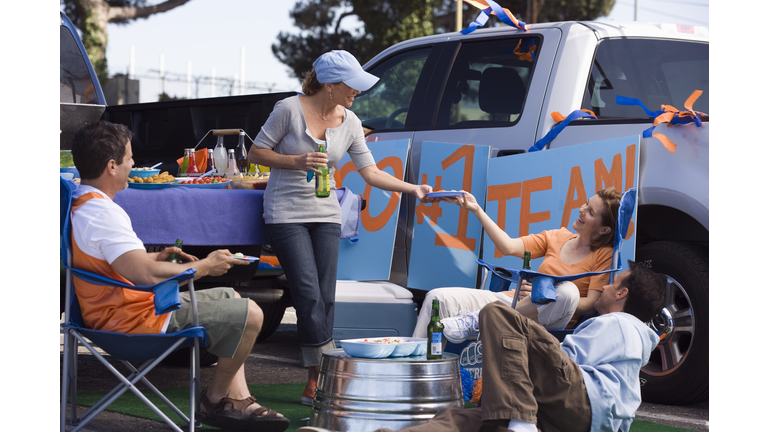 Friends enjoying tailgate party