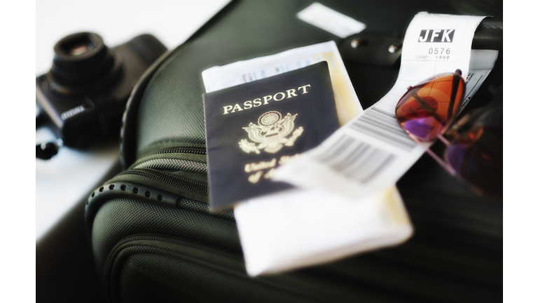 Close up of passport and travel accessories